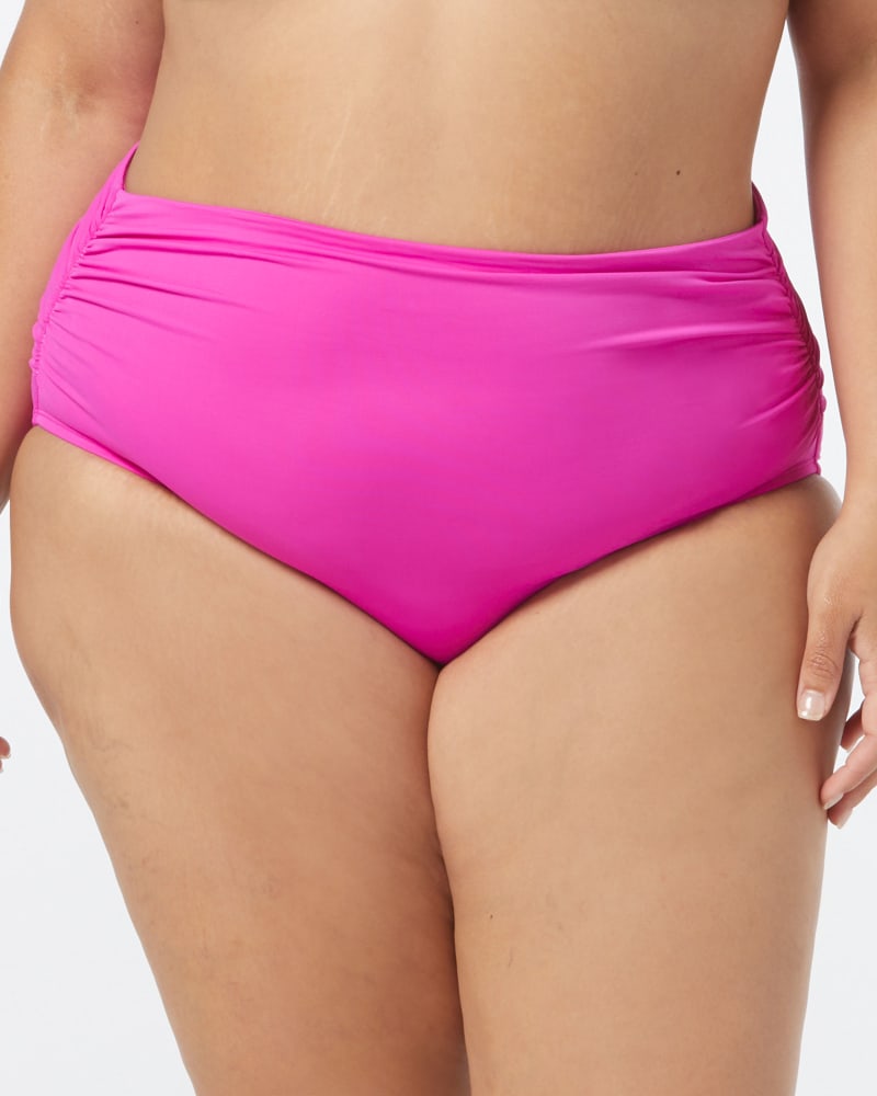 Front of a model wearing a size XL IMPULSE BOTTOM in PINK TROPICS by Coco Reef. | dia_product_style_image_id:332724